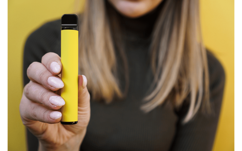 Holding a Disposable Vape